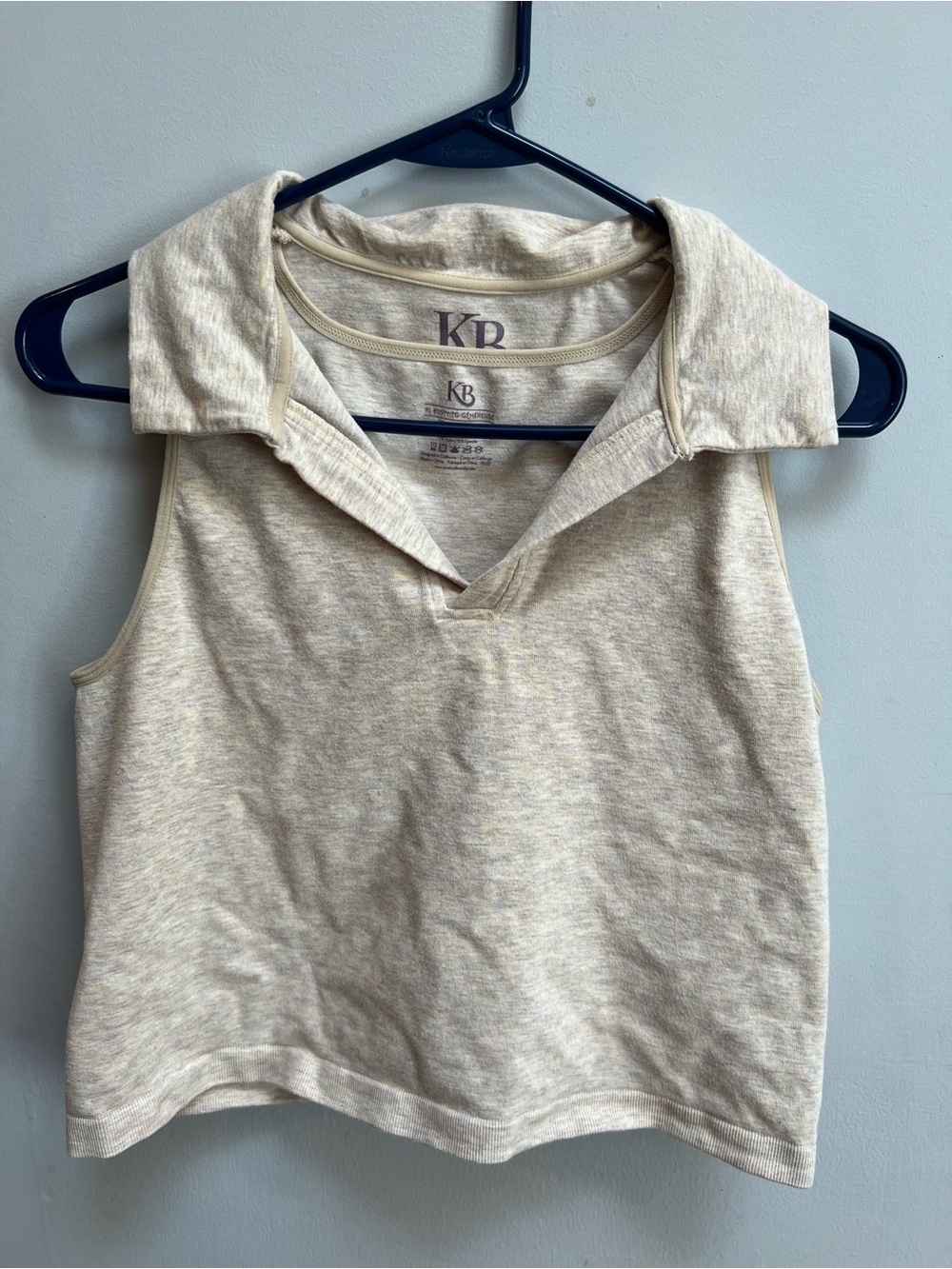 Kindred Bravely Cream Sleeveless Polo Pumping Top